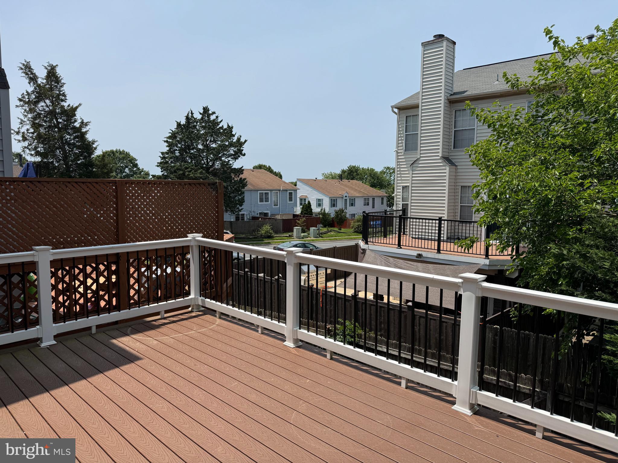 6110 George Baylor Drive Centreville, VA 20121 - Photo 3 of 12 a view of balcony with wooden floor and fence