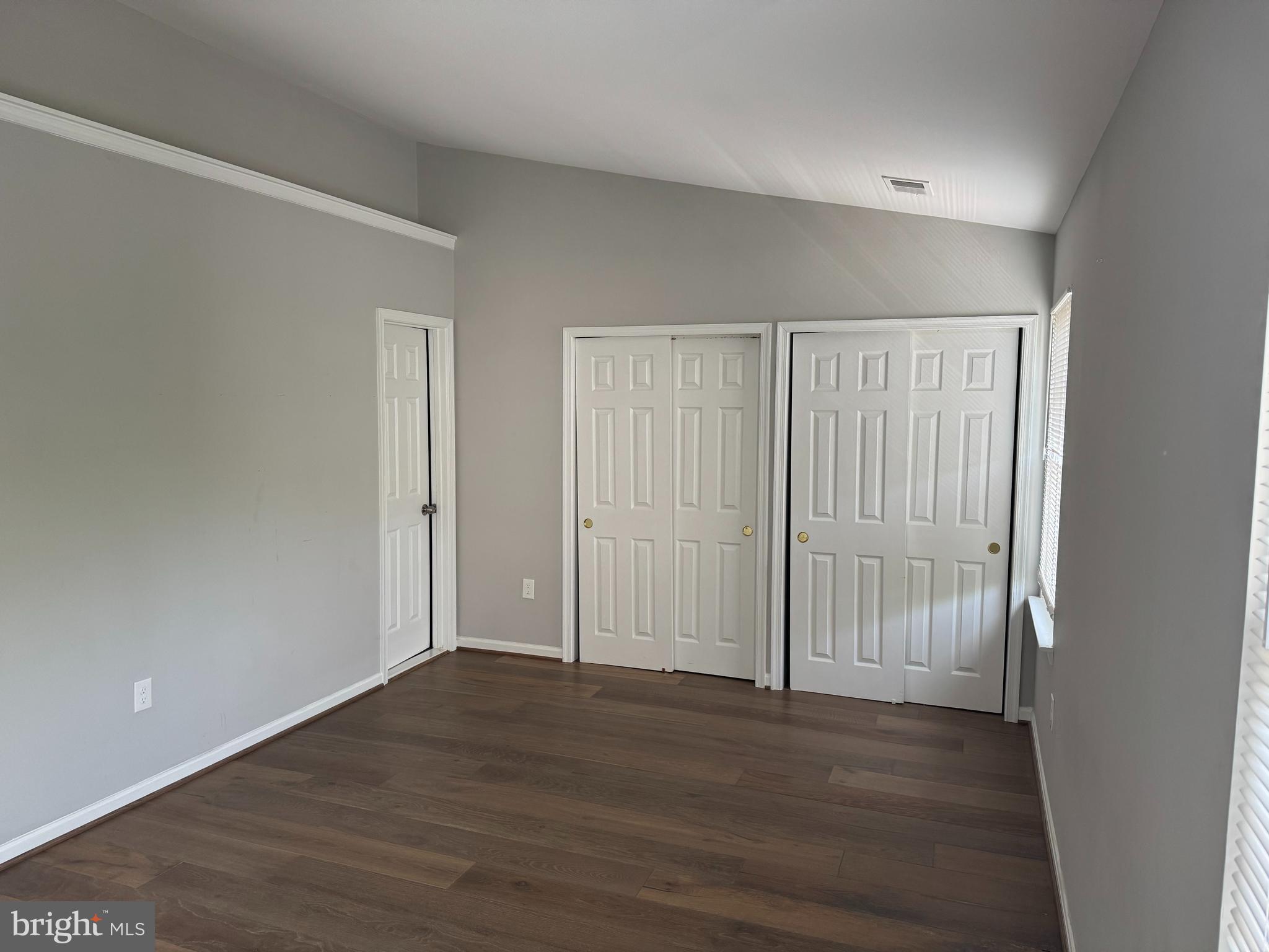 6110 George Baylor Drive Centreville, VA 20121 - Photo 6 of 12 a view of wooden floor and entryway in a room