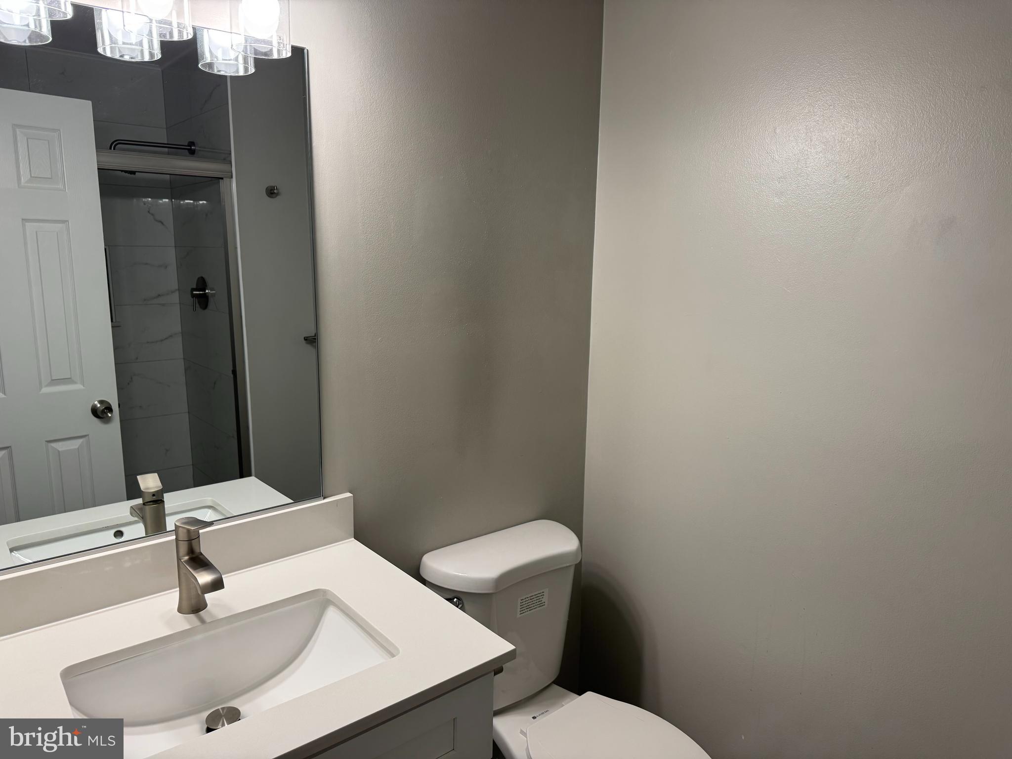 6110 George Baylor Drive Centreville, VA 20121 - Photo 10 of 12 a bathroom with a sink a toilet