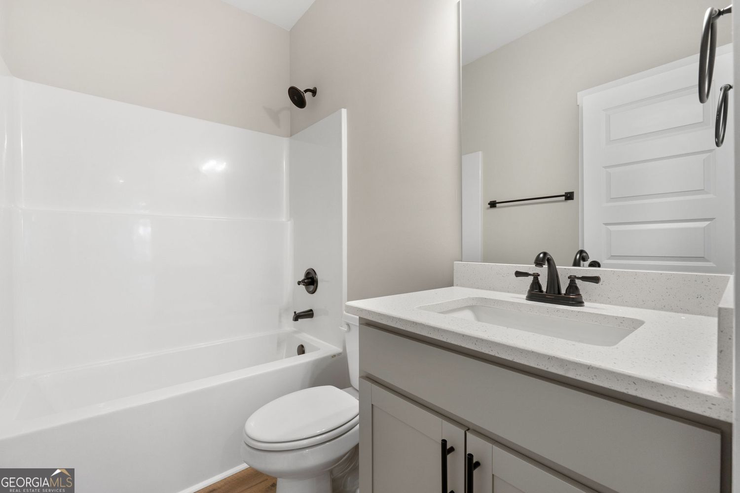 1578 English Road Forsyth, GA 31029 - Photo 19 of 39 a bathroom with a sink a toilet and a bathtub