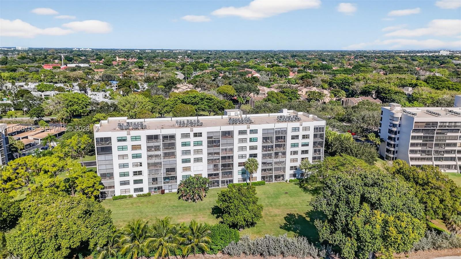 6530 Boca Del Mar Drive, Unit 235 Boca Raton, FL 33433 - Photo 32 of 34 a view of a city with tall buildings
