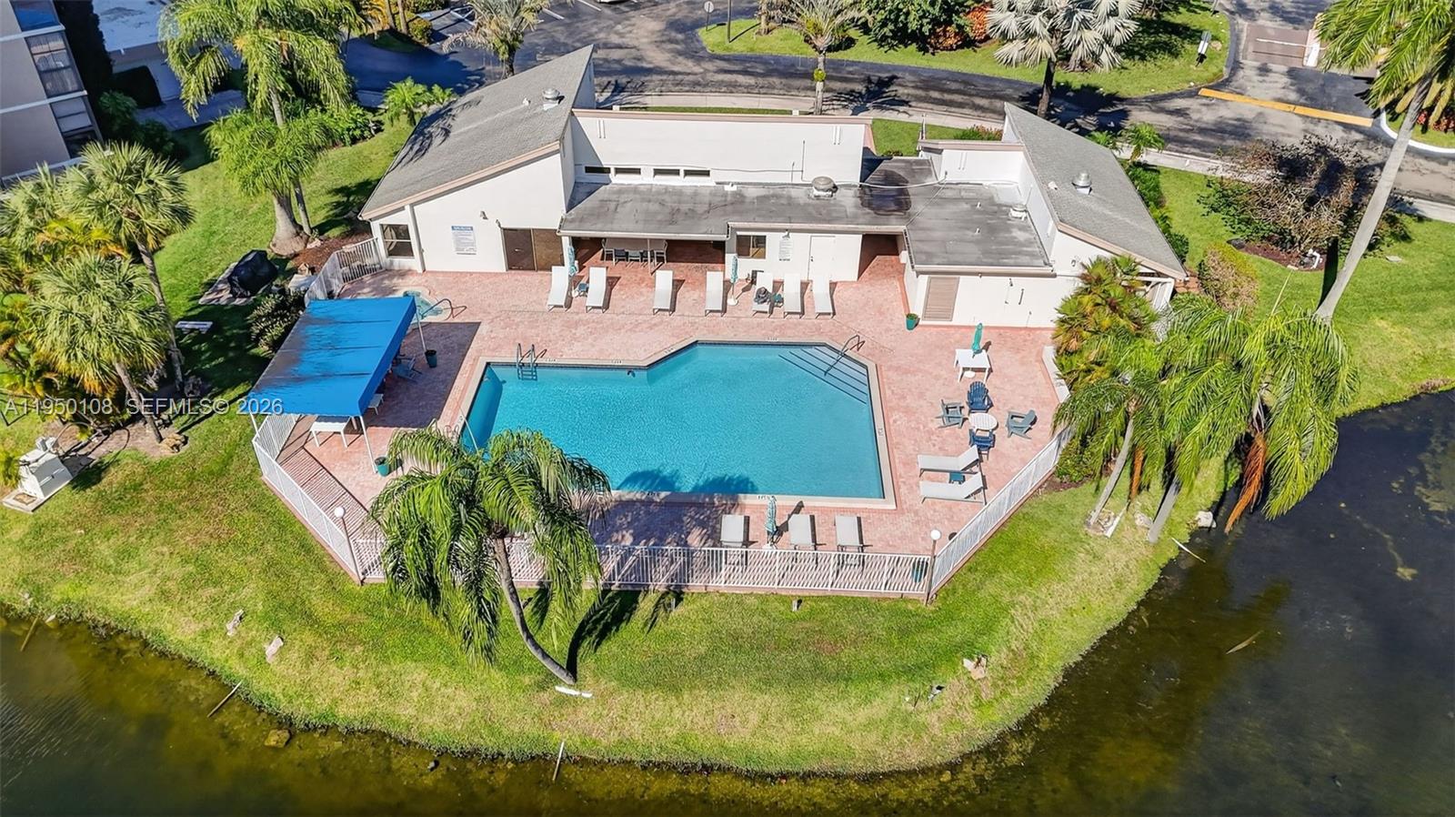 6530 Boca Del Mar Drive, Unit 235 Boca Raton, FL 33433 - Photo 33 of 34 an aerial view of a house with a swimming pool