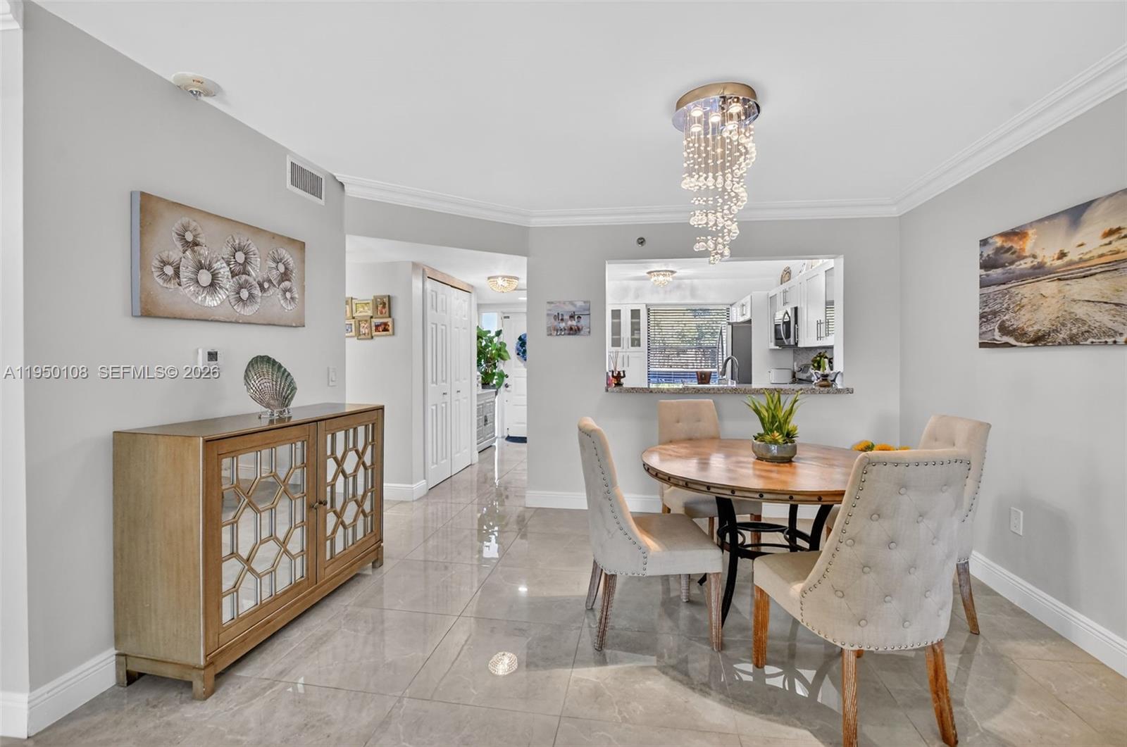 6530 Boca Del Mar Drive, Unit 235 Boca Raton, FL 33433 - Photo 6 of 34 a view of a dining room with furniture window and wooden floor
