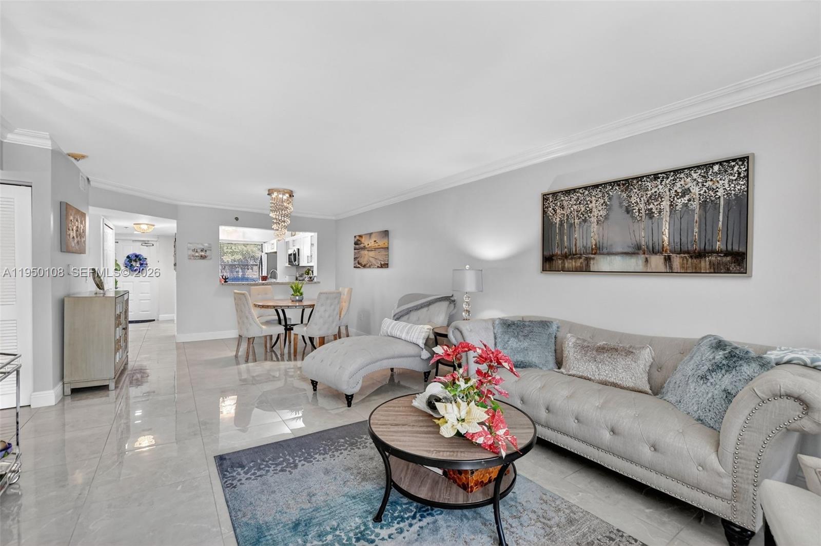 6530 Boca Del Mar Drive, Unit 235 Boca Raton, FL 33433 - Photo 9 of 34 a living room with furniture and a wooden floor
