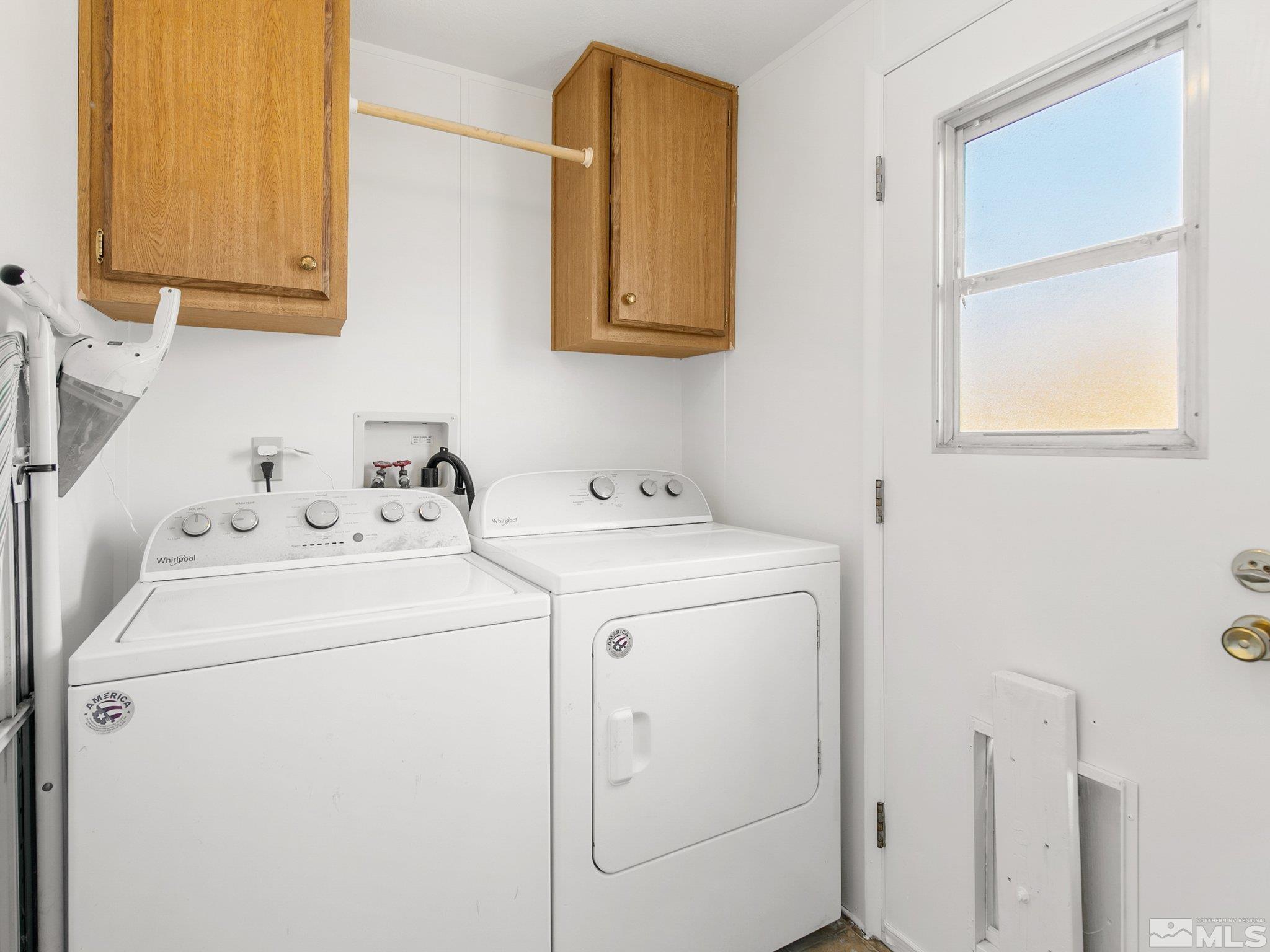 17280 Whippoorwill Lane Reno, NV 89508 - Photo 12 of 26 a utility room with dryer and washer