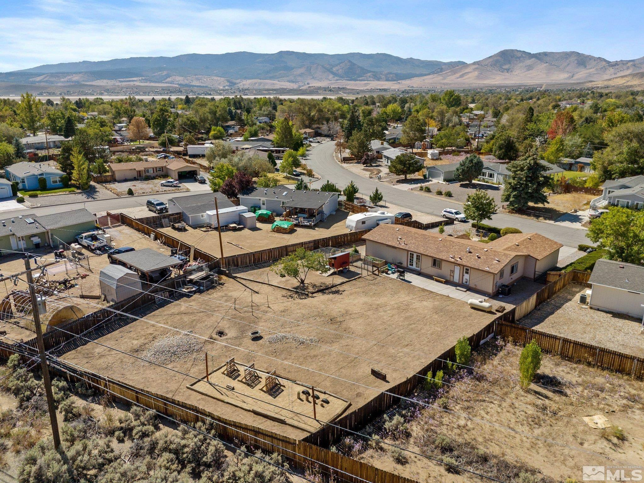 17280 Whippoorwill Lane Reno, NV 89508 - Photo 19 of 26 an aerial view of a residential houses and city view