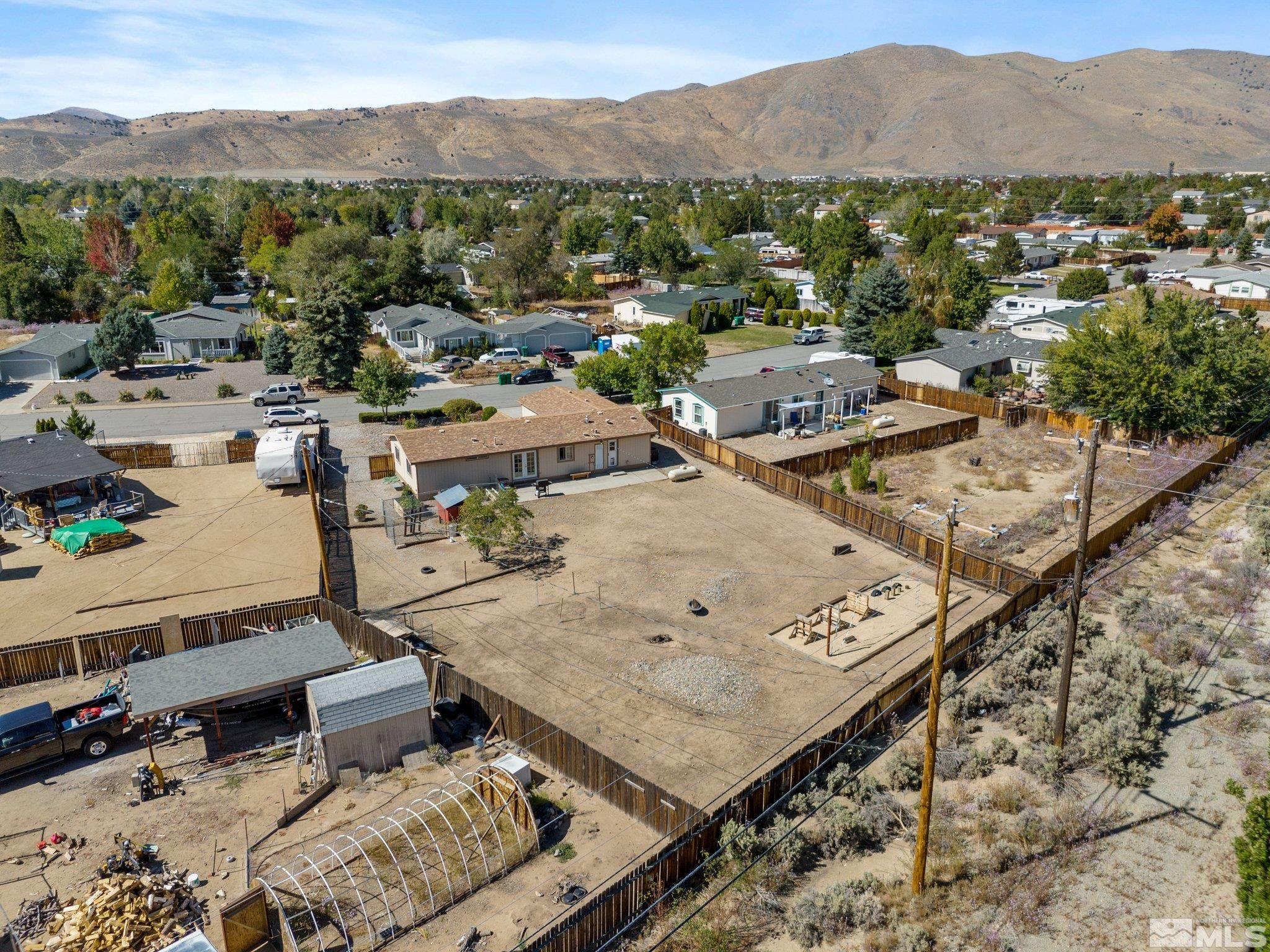 17280 Whippoorwill Lane Reno, NV 89508 - Photo 21 of 26 a view of a terrace with a table and chairs