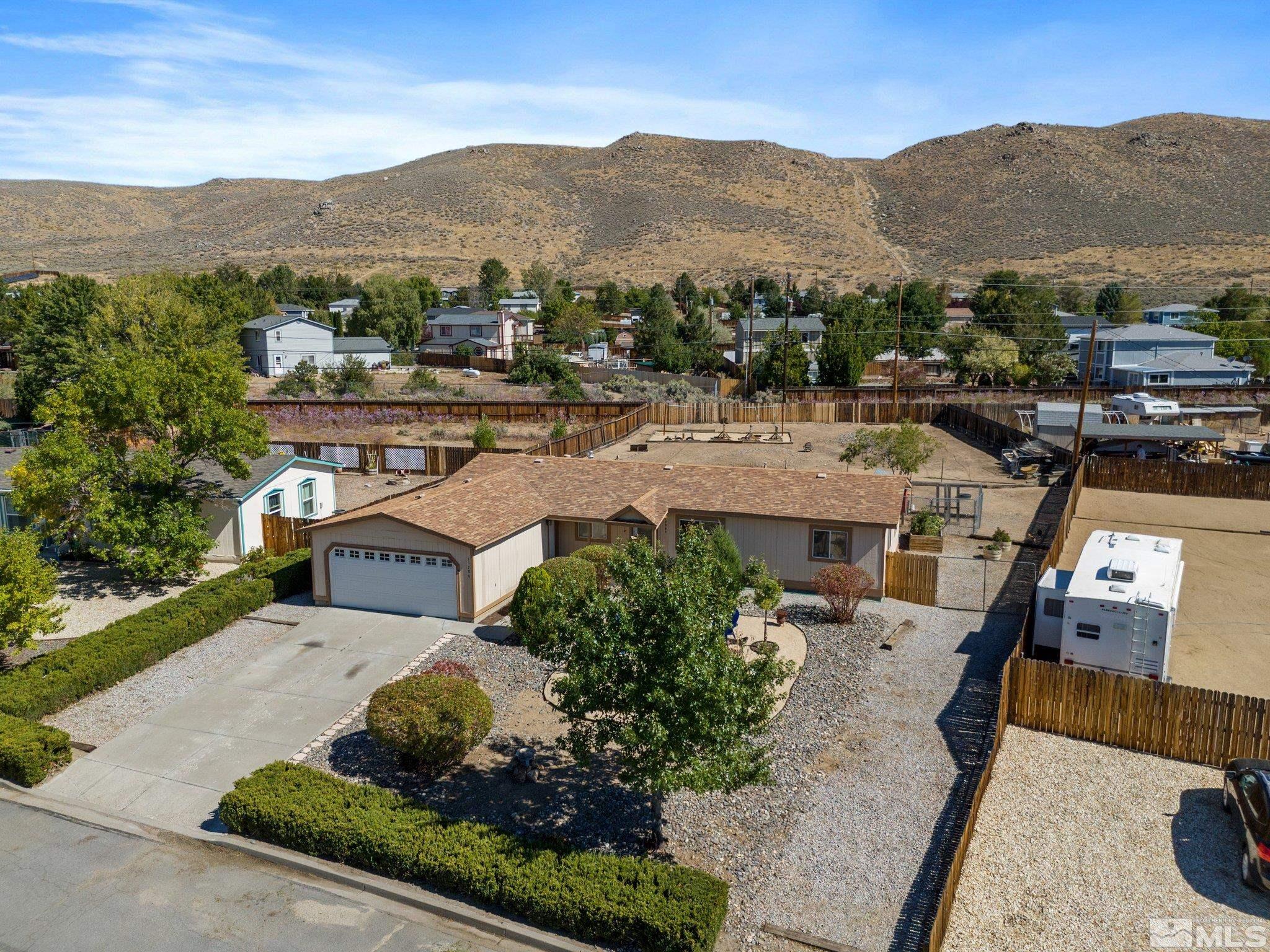 17280 Whippoorwill Lane Reno, NV 89508 - Photo 23 of 26 an aerial view of a house with a garden