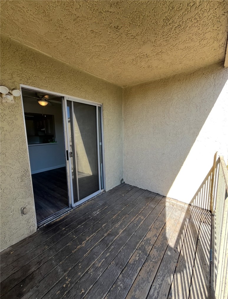 1025 North Tippecanoe, Unit 151 San Bernardino, CA 92410 - Photo 9 of 11 a view of a hallway with wooden floor