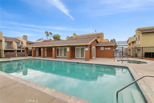 a view of a house with a swimming pool