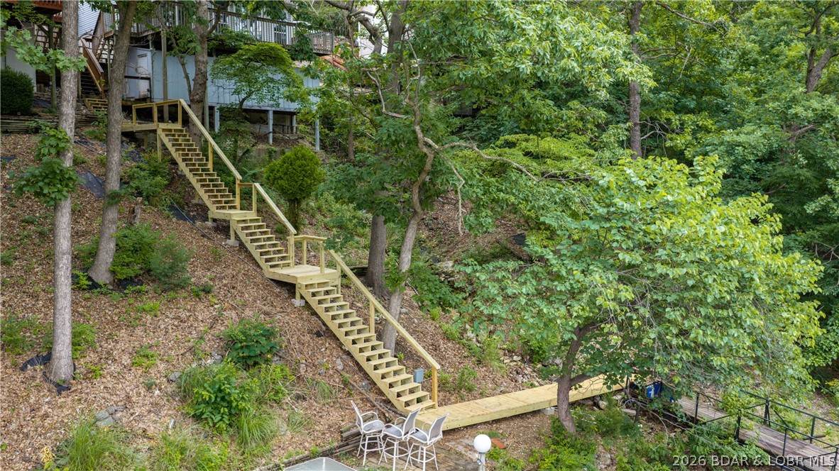 57 Arrowhead Beach Road Lake Ozark, MO 65049 - Photo 12 of 32 New stairs down to lakefront