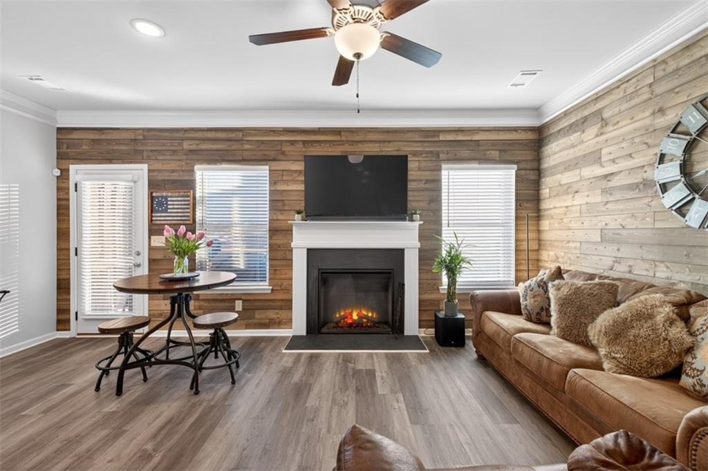 286 Turtle Creek Drive Winder, GA 30680 - Photo 14 of 39 a living room with furniture and a fireplace