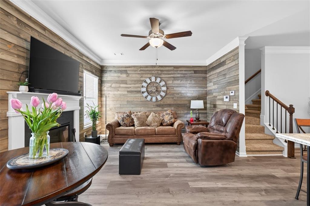 286 Turtle Creek Drive Winder, GA 30680 - Photo 15 of 39 a living room with furniture fireplace and a flat screen tv