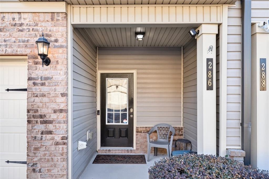 286 Turtle Creek Drive Winder, GA 30680 - Photo 2 of 39 a front view of a house with outdoor seating