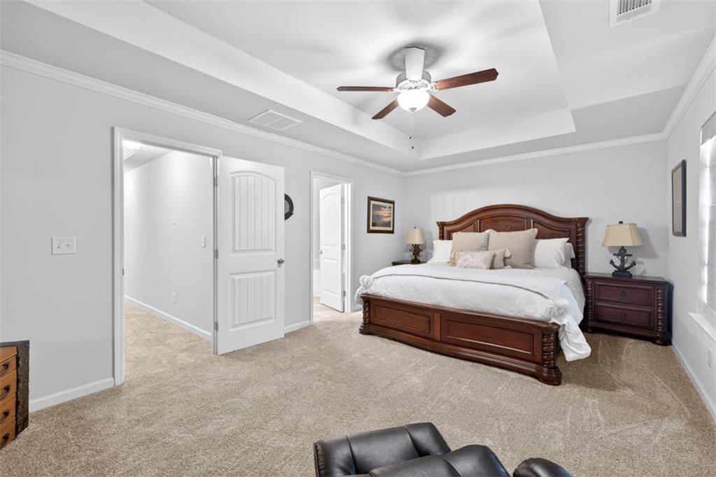 286 Turtle Creek Drive Winder, GA 30680 - Photo 21 of 39 a bedroom with a bed and closet