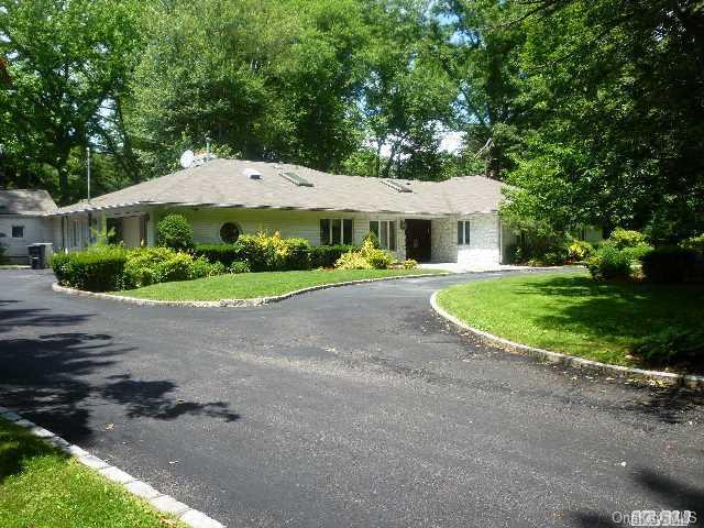 922 Middle Neck Road Great Neck, NY 11024 - Photo 1 of 1 a view of a house with a yard and potted plants