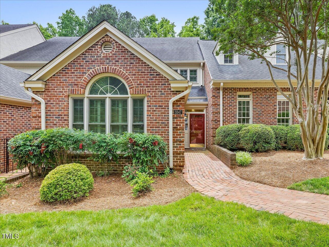 3347 Ridgecrest Court Raleigh, NC 27607 - Photo 1 of 65 a front view of a house with a yard