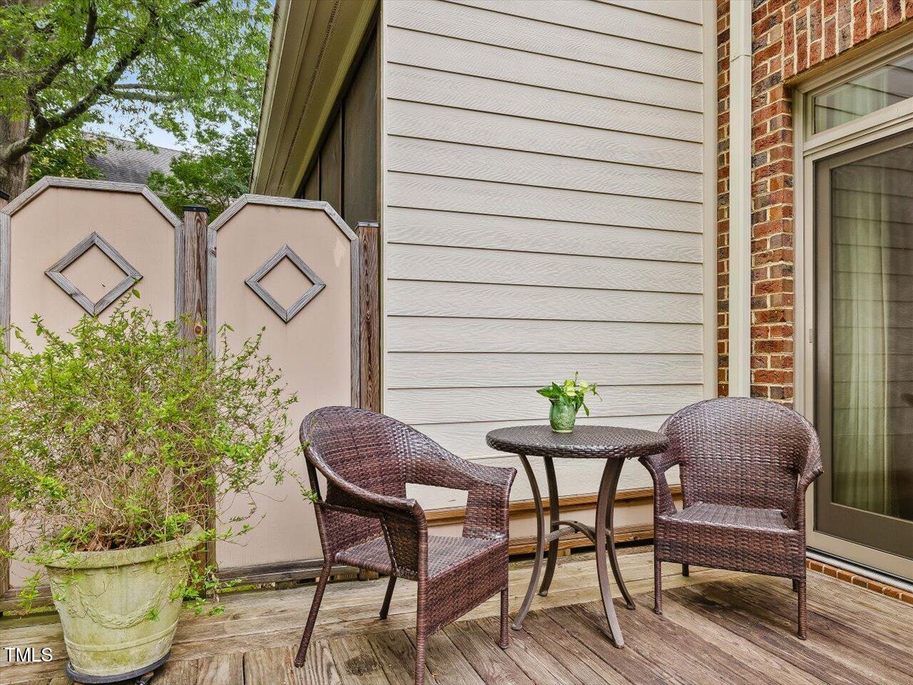 3347 Ridgecrest Court Raleigh, NC 27607 - Photo 27 of 65 a couple of chairs sitting in front of a house