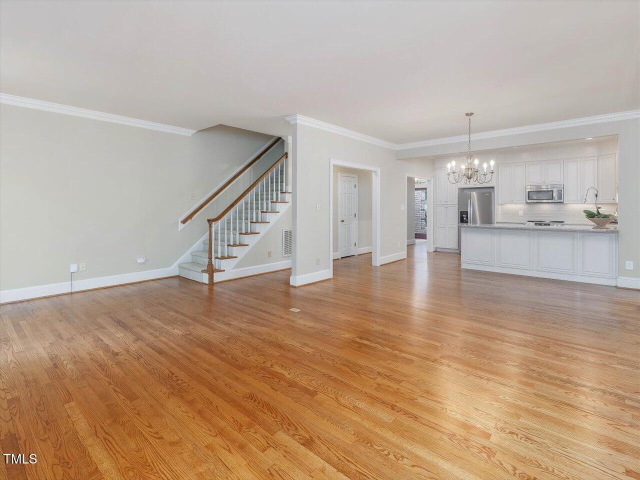 3347 Ridgecrest Court Raleigh, NC 27607 - Photo 65 of 65 a view of empty room with wooden floor