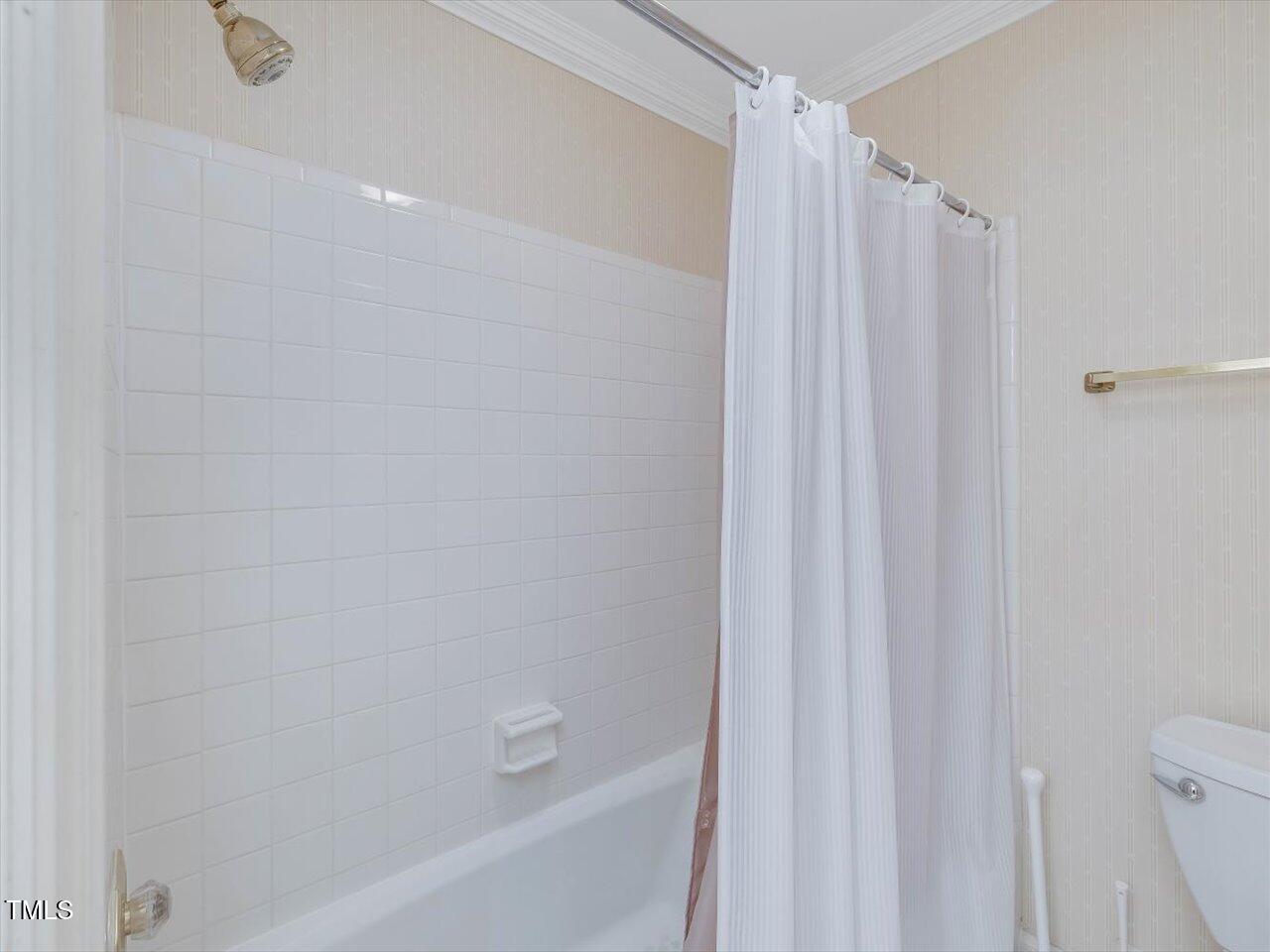 3347 Ridgecrest Court Raleigh, NC 27607 - Photo 53 of 65 a bathroom with a shower and a toilet