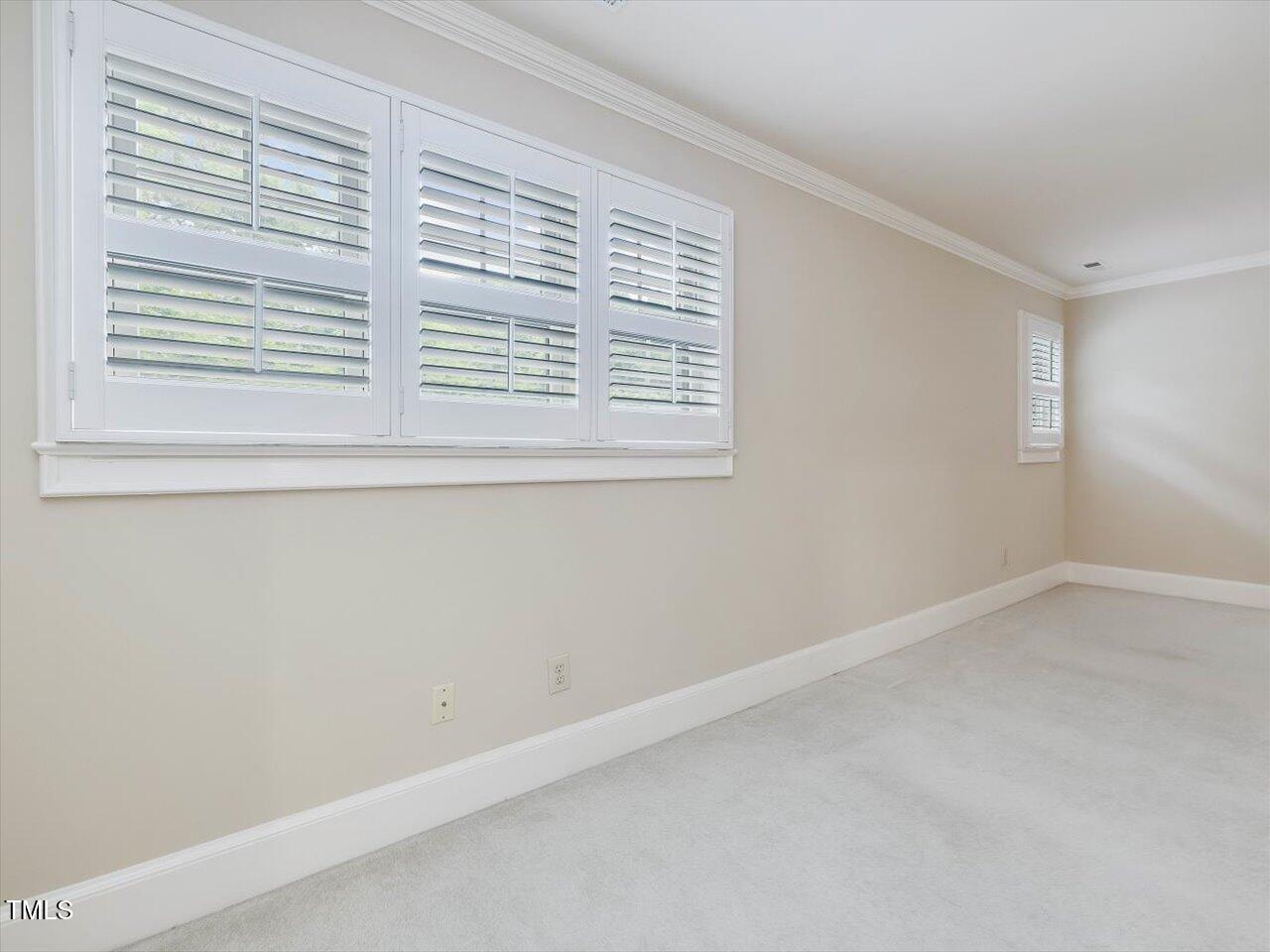 3347 Ridgecrest Court Raleigh, NC 27607 - Photo 58 of 65 an empty room with a window