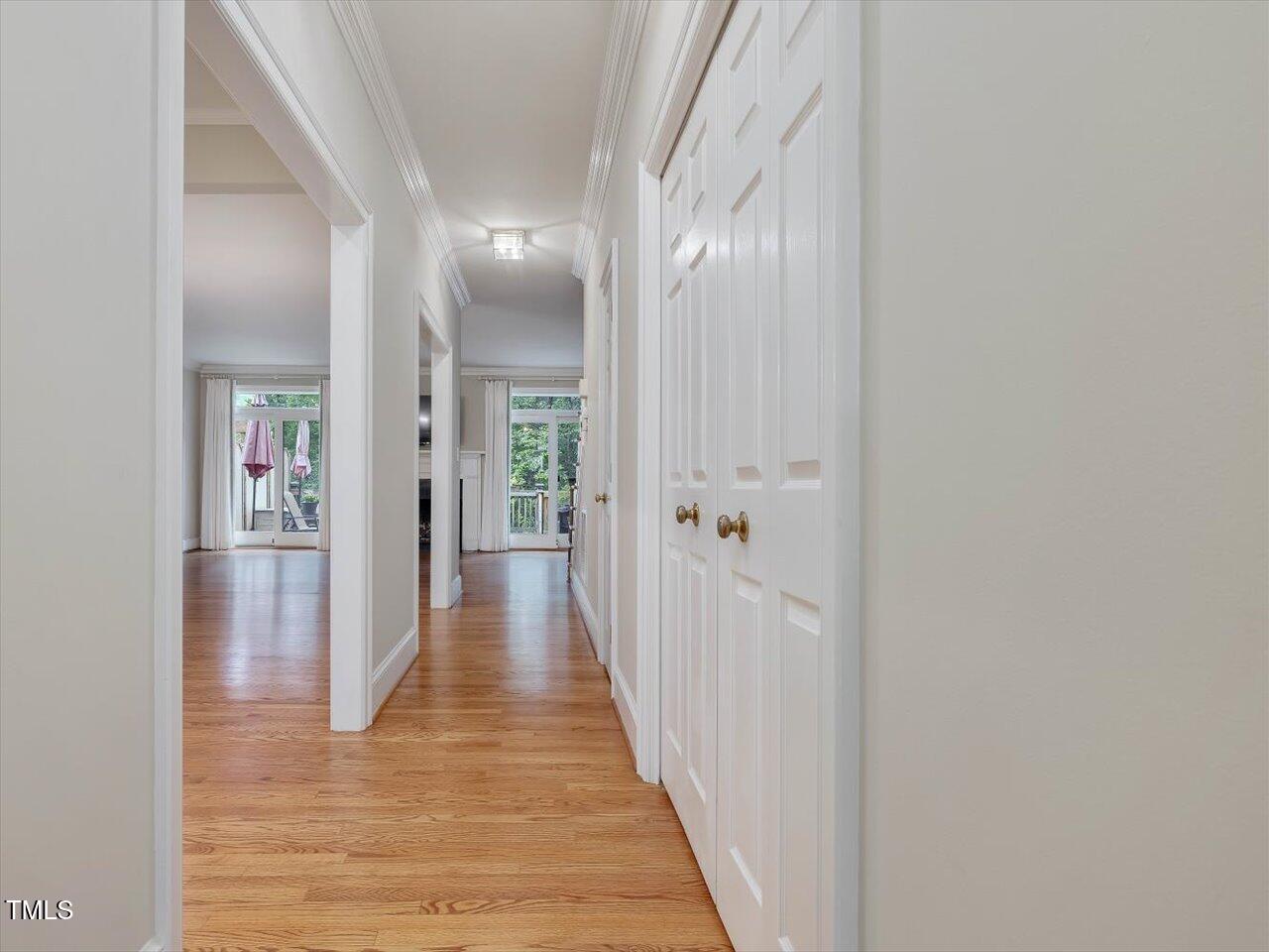 3347 Ridgecrest Court Raleigh, NC 27607 - Photo 7 of 65 a view of a hallway with wooden floor