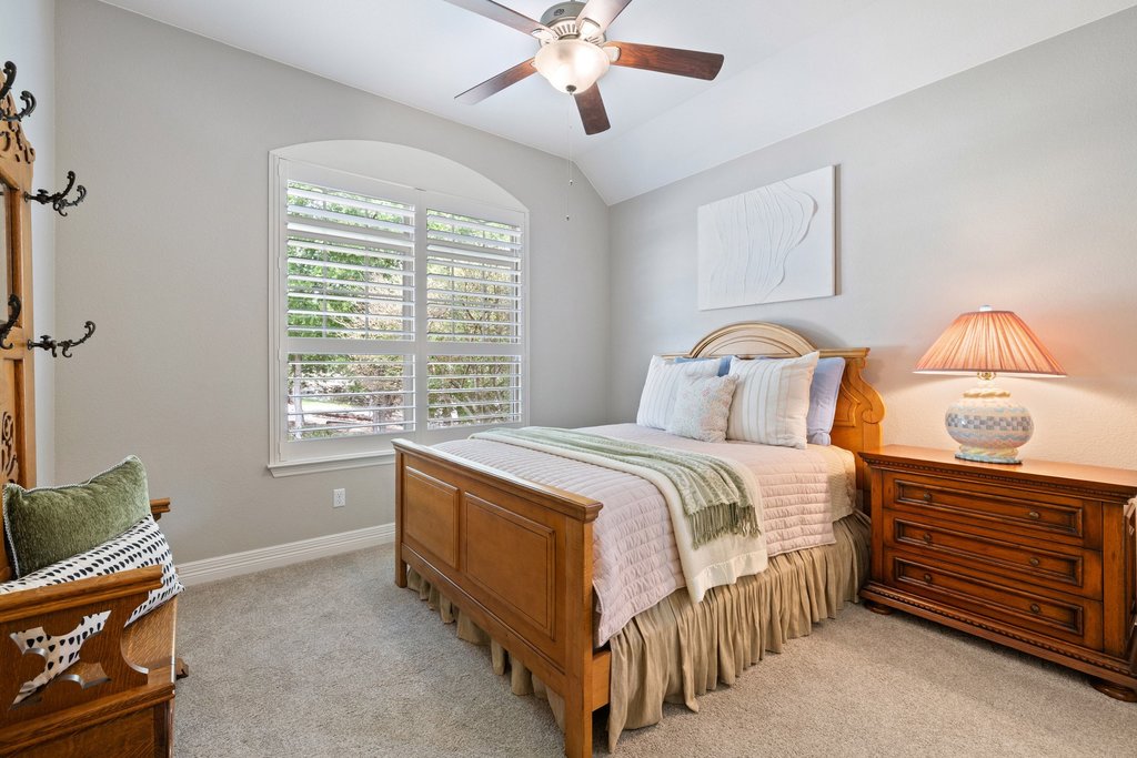 108 Berry Cove Georgetown, TX 78628 - Photo 20 of 39 a bedroom with a bed and a window