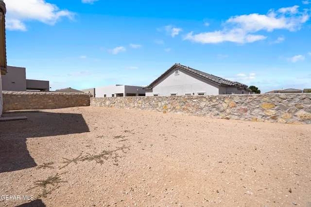 a view of a dry yard with a snow