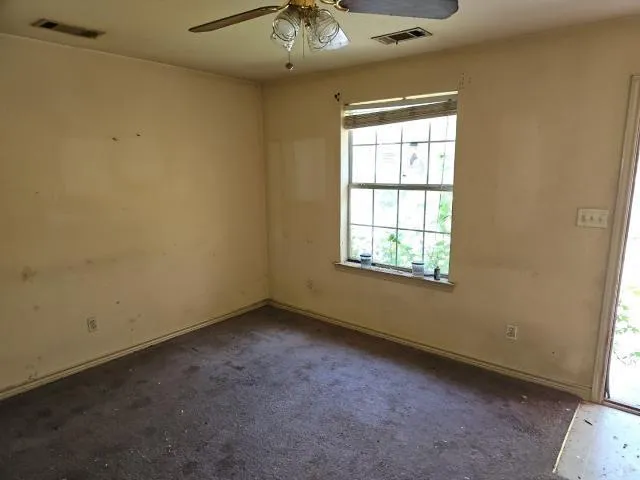 an empty room with a window