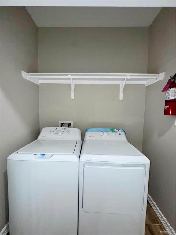 605 Sparrow Road Weslaco, TX 78596 - Photo 29 of 31 a utility room with dryer and washer