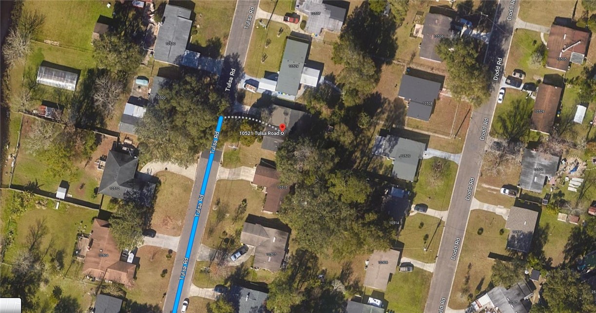 10521 Tulsa Road Jacksonville, FL 32218 - Photo 1 of 1 an aerial view of a residential apartment building with yard