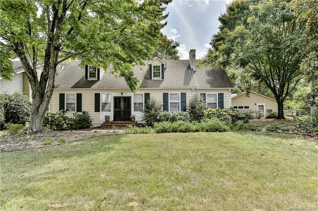 621 Westbury Road Charlotte, NC 28211 - Photo 1 of 45 a front view of a house with a yard