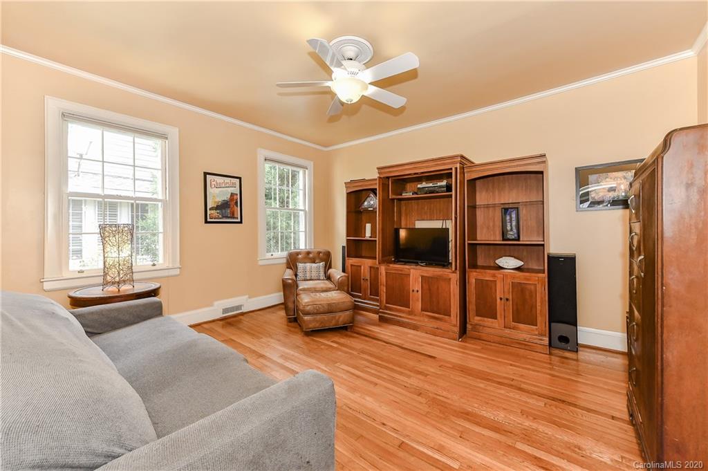 621 Westbury Road Charlotte, NC 28211 - Photo 22 of 45 a living room with furniture and wooden floor