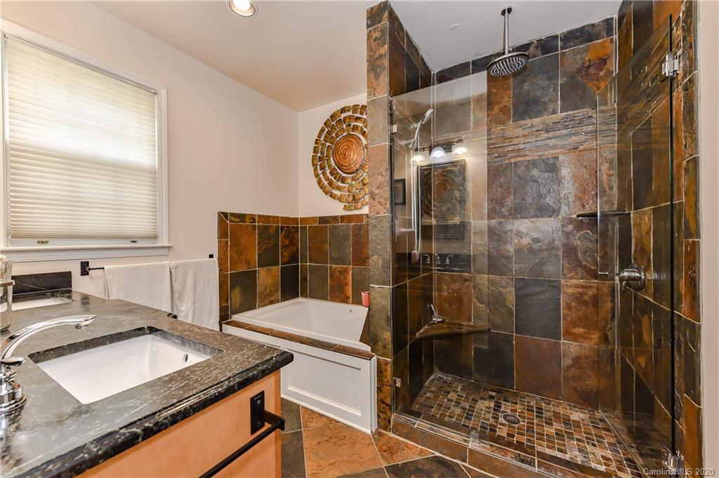 621 Westbury Road Charlotte, NC 28211 - Photo 25 of 45 a bathroom with a sink toilet and shower