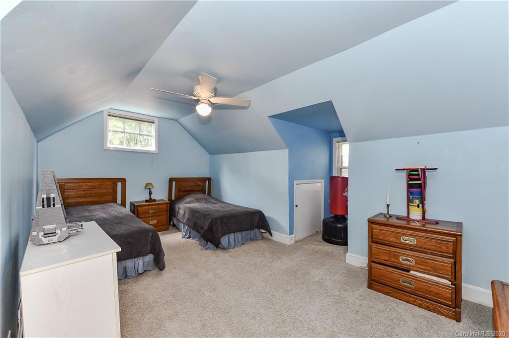 621 Westbury Road Charlotte, NC 28211 - Photo 28 of 45 a view of livingroom with furniture and a ceiling fan