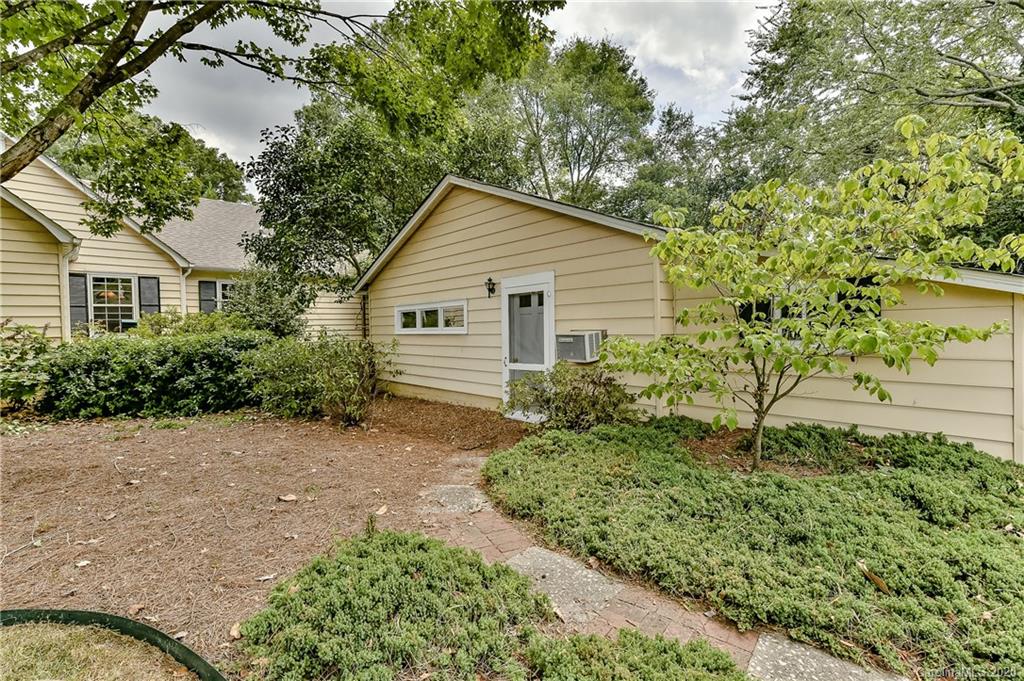 621 Westbury Road Charlotte, NC 28211 - Photo 38 of 45 a view of a house with a yard and plants