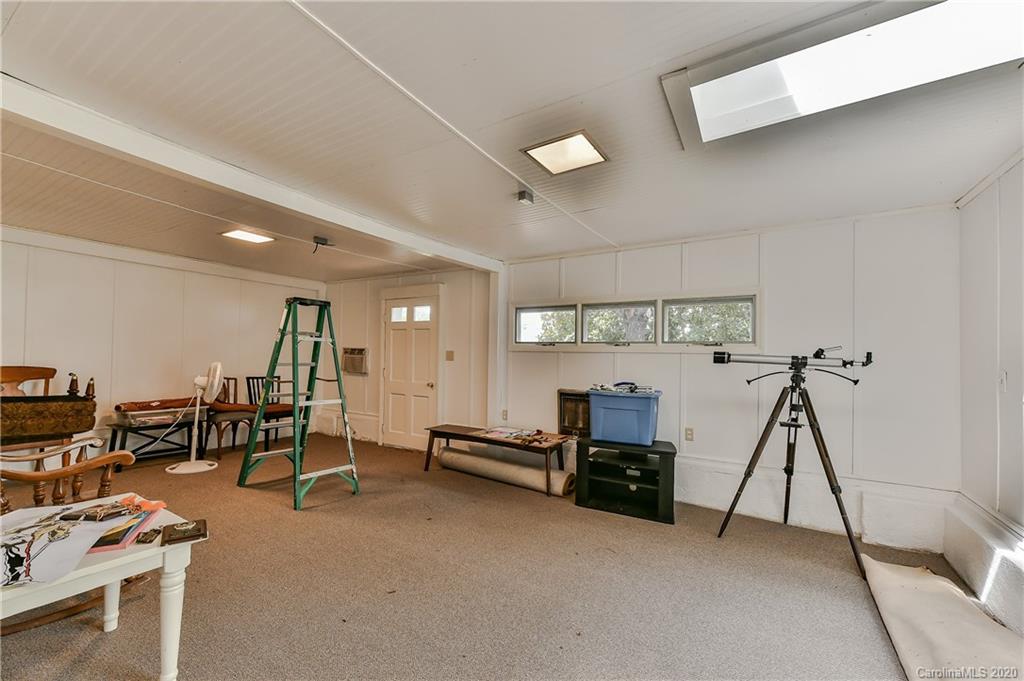621 Westbury Road Charlotte, NC 28211 - Photo 40 of 45 a view of a room with gym equipment
