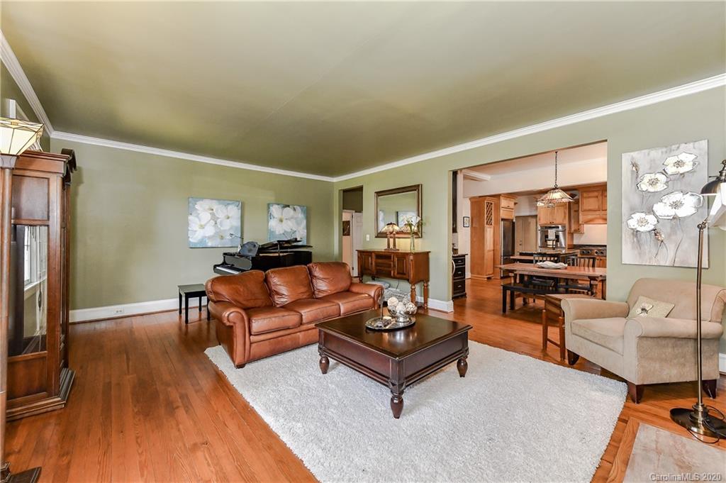 621 Westbury Road Charlotte, NC 28211 - Photo 5 of 45 a living room with furniture and a flat screen tv