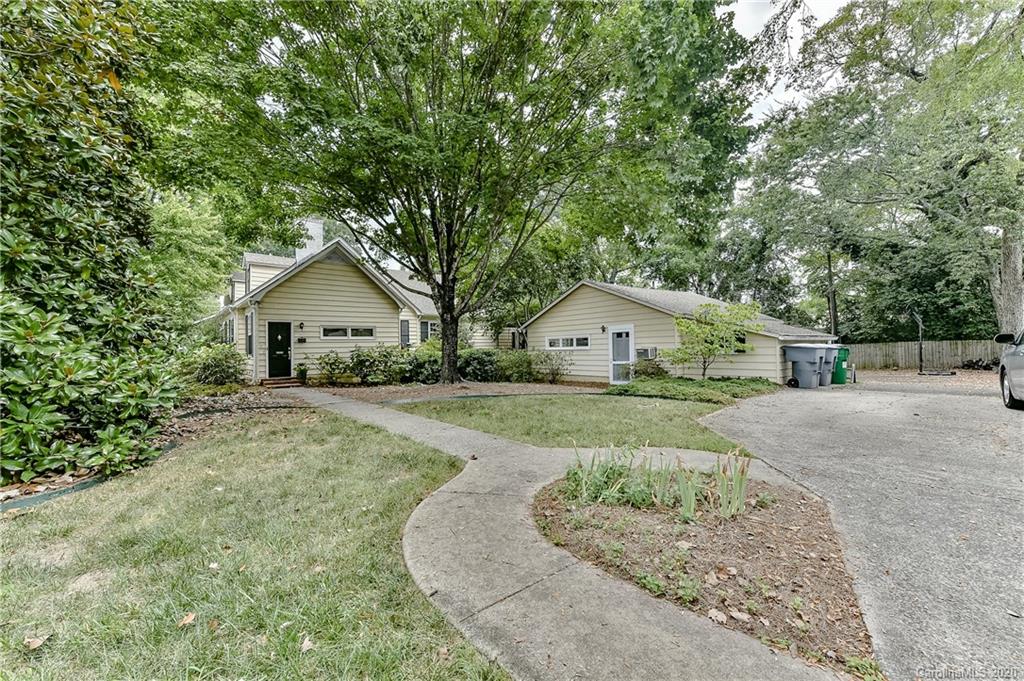 621 Westbury Road Charlotte, NC 28211 - Photo 41 of 45 a front view of house with a yard and green space