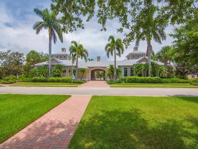 a view of green field with sign board