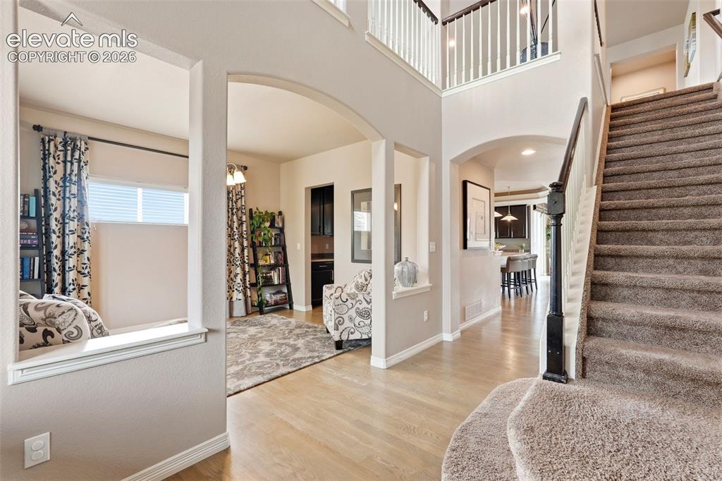 2264 Reed Grass Way Colorado Springs, CO 80915 - Photo 2 of 50 a bedroom with furniture and a window