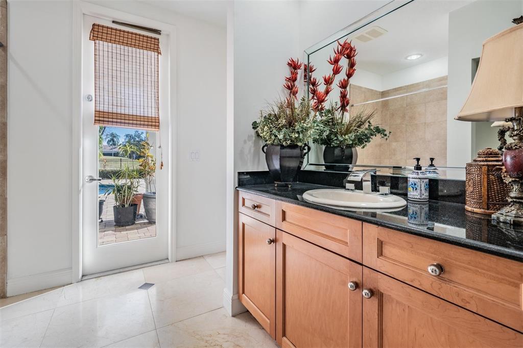 10628 Pontofino Circle Trinity, FL 34655 - Photo 37 of 75 a bathroom with a sink and mirror