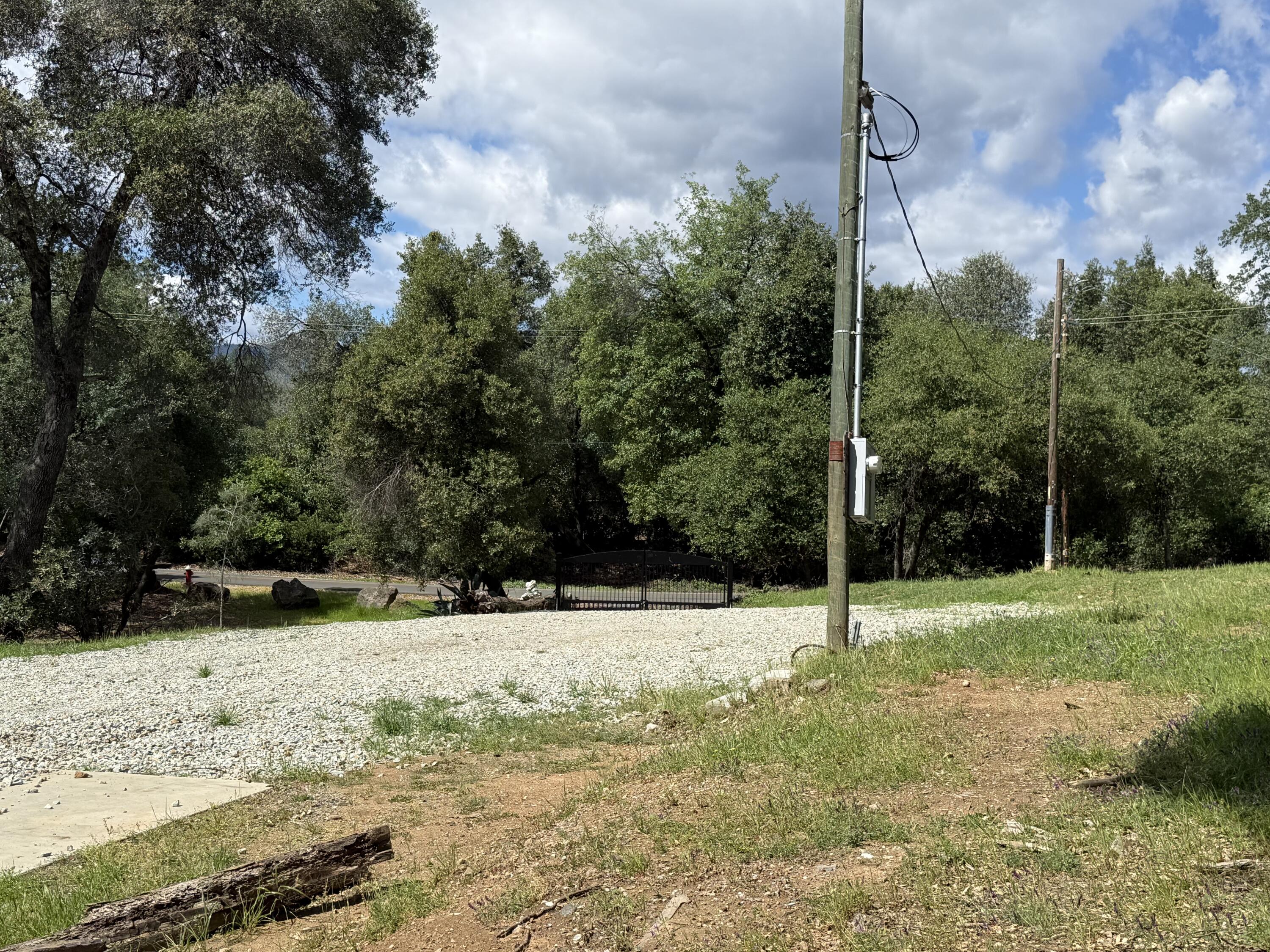 12333 Quartz Hill Road Redding, CA 96003 - Photo 18 of 21 a view of a yard with a tree