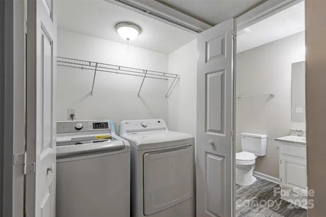 a view of bathroom with a sink toilet and a shower