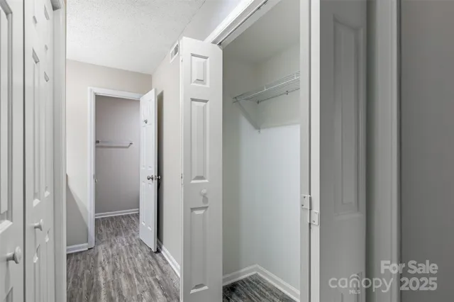 a view of a bathroom from a hallway