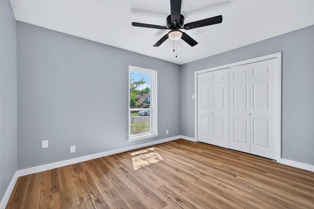 1401 La Salle Drive Sherman, TX 75090 - Photo 15 of 24 wooden floor in an empty room with a window