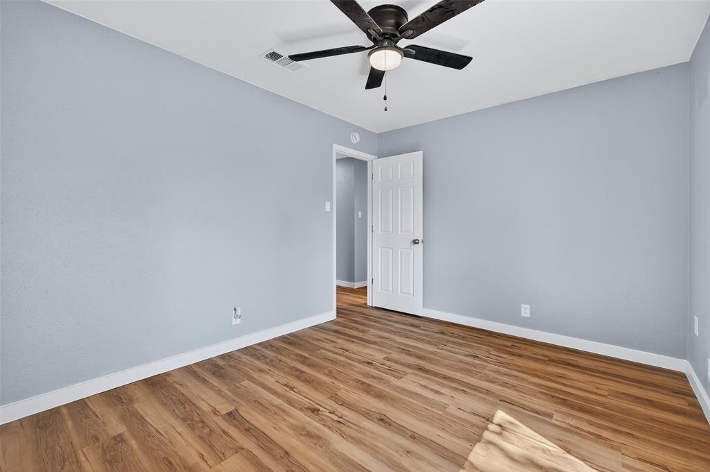 1401 La Salle Drive Sherman, TX 75090 - Photo 16 of 24 a view of an empty room with wooden floor