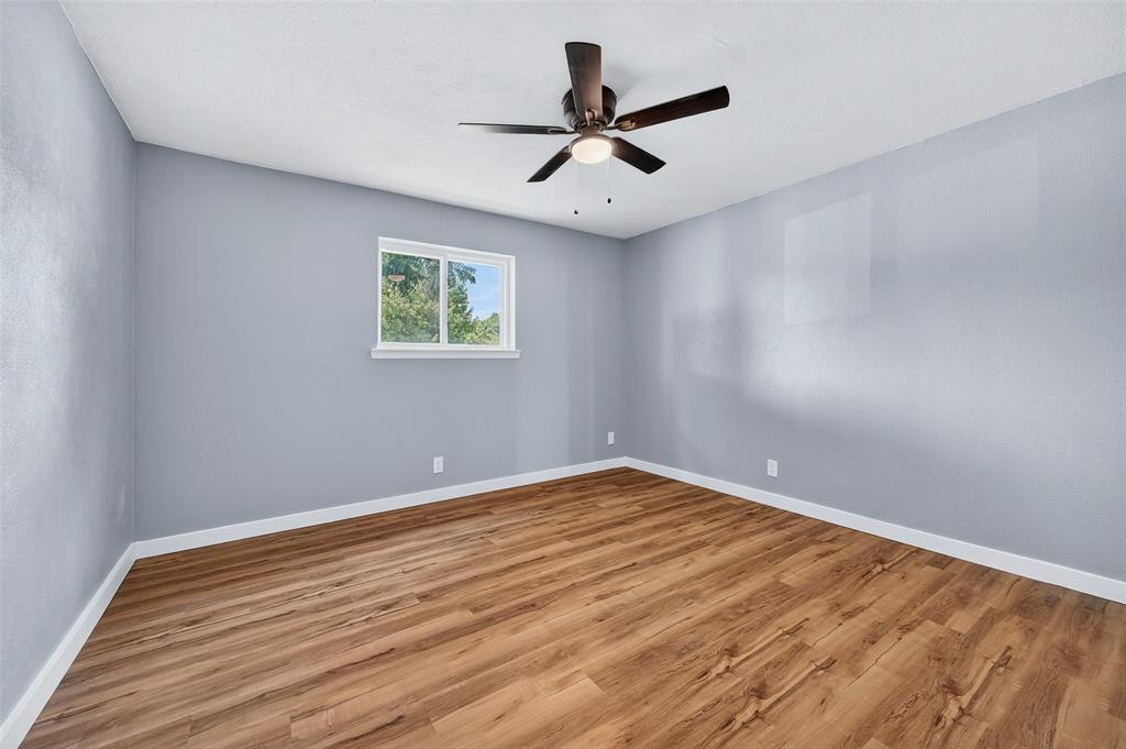 1401 La Salle Drive Sherman, TX 75090 - Photo 18 of 24 a view of empty room with wooden floor