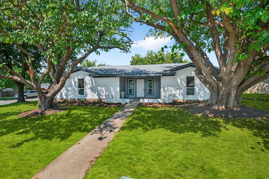 1401 La Salle Drive Sherman, TX 75090 - Photo 2 of 24 a front view of a house with yard and green space
