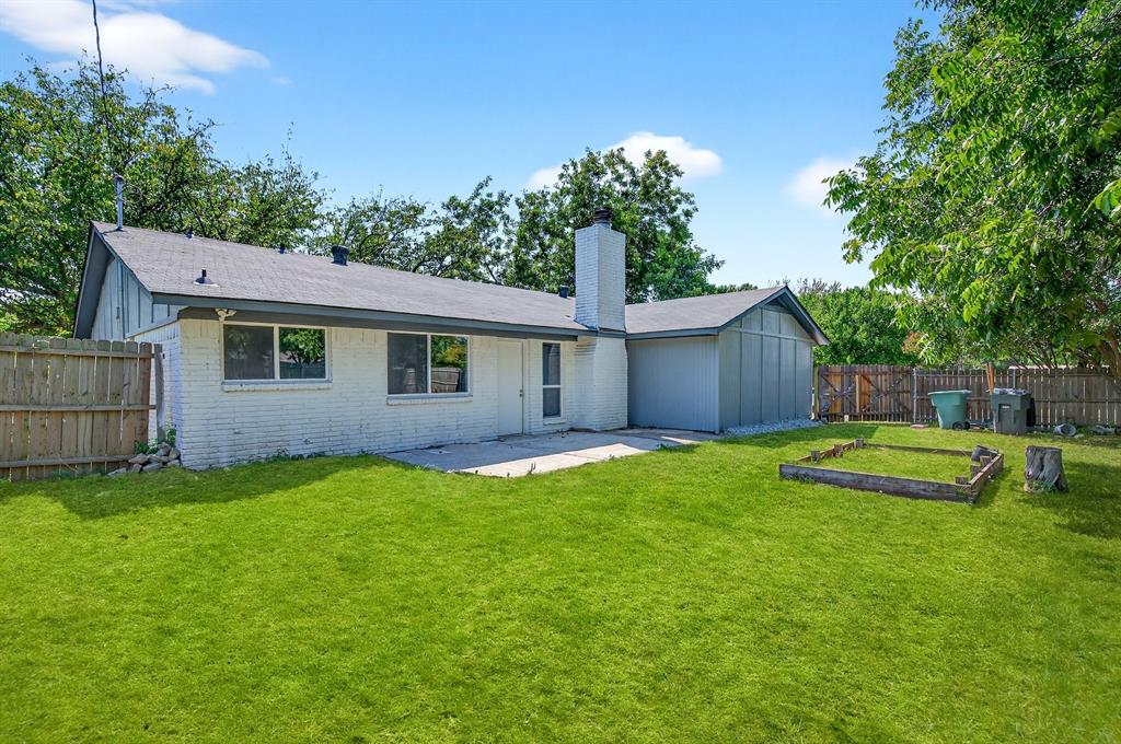 1401 La Salle Drive Sherman, TX 75090 - Photo 23 of 24 a view of a house with a backyard and a patio